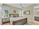 Bedroom with king-size bed and ensuite bathroom at 2510 Gulf N Dr, Bradenton Beach, FL 34217