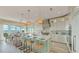 Spacious kitchen with white cabinets and island at 2510 Gulf N Dr, Bradenton Beach, FL 34217