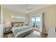 King-size bed, ocean view, and private balcony at 2510 Gulf N Dr, Bradenton Beach, FL 34217