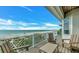 Spacious balcony with ocean view and outdoor seating at 2510 Gulf N Dr, Bradenton Beach, FL 34217
