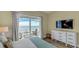 Bedroom with king-size bed and ocean view at 2510 Gulf N Dr, Bradenton Beach, FL 34217