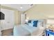 Bright bedroom with king-size bed and private TV at 2510 Gulf N Dr, Bradenton Beach, FL 34217