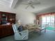 Living room with access to balcony at 5906 Garden Ln # A22, Bradenton, FL 34207