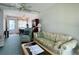 Living Room with sofa, recliner, and coffee table at 5906 Garden Ln # A22, Bradenton, FL 34207