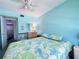 Bright bedroom with a queen-size bed and en-suite bathroom at 5906 Garden Ln # A22, Bradenton, FL 34207