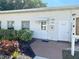 Community office building with a clean and welcoming entrance at 5906 Garden Ln # A22, Bradenton, FL 34207