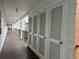 Hallway view with storage units at 5906 Garden Ln # A22, Bradenton, FL 34207