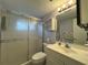 Clean bathroom with shower, toilet and vanity at 5906 Garden Ln # A22, Bradenton, FL 34207