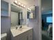 Bathroom with vanity, medicine cabinet, and shower at 5906 Garden Ln # A22, Bradenton, FL 34207