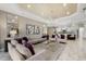 Living room with an open floor plan, and kitchen views at 12014 Perennial Pl, Lakewood Ranch, FL 34211