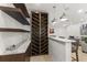 Custom wine cellar with ample storage and a modern design at 12014 Perennial Pl, Lakewood Ranch, FL 34211