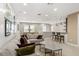 Large Gathering room with sectional sofa and home bar at 12014 Perennial Pl, Lakewood Ranch, FL 34211