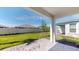 Landscaped backyard with patio and privacy fence at 16132 Ivy Ridge Ct, Port Charlotte, FL 33953