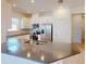 Kitchen island with double sink and expansive countertop at 16132 Ivy Ridge Ct, Port Charlotte, FL 33953