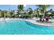 Inviting pool area with comfortable loungers for relaxation at 16132 Ivy Ridge Ct, Port Charlotte, FL 33953