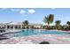 Large resort-style pool with plenty of lounge chairs at 16132 Ivy Ridge Ct, Port Charlotte, FL 33953