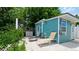 Charming guest house with lounge chairs and a patio area at 3005 39Th W Ave, Bradenton, FL 34205