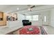 Living room features a red rug and leather recliner at 3005 39Th W Ave, Bradenton, FL 34205