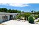 Single story home with double doors, nicely landscaped, and a long driveway at 3005 39Th W Ave, Bradenton, FL 34205