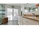 Main bathroom with double vanity and access to pool at 3005 39Th W Ave, Bradenton, FL 34205