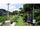 Landscaped backyard with a variety of plants and a grassy area at 3005 39Th W Ave, Bradenton, FL 34205
