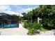 Private backyard oasis with a pool and lush landscaping at 3005 39Th W Ave, Bradenton, FL 34205
