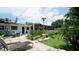 Enjoy the spacious backyard with a patio and lush landscaping at 3005 39Th W Ave, Bradenton, FL 34205