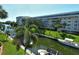 Community view showcasing waterfront location and landscaping at 1300 N Portofino Dr # 305, Sarasota, FL 34242
