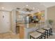Well-equipped kitchen featuring granite countertops and stainless steel appliances at 1300 N Portofino Dr # 305, Sarasota, FL 34242