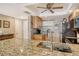 Kitchen with granite countertops and modern appliances at 1300 N Portofino Dr # 305, Sarasota, FL 34242
