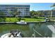 Scenic waterfront view with boats docked along canal at 1300 N Portofino Dr # 305, Sarasota, FL 34242