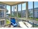 Relaxing screened balcony with water views at 1300 N Portofino Dr # 305, Sarasota, FL 34242
