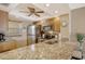 Modern kitchen with granite countertops and stainless steel appliances at 1300 N Portofino Dr # 305, Sarasota, FL 34242