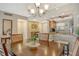 Bright dining area with view of kitchen and living room at 1300 N Portofino Dr # 305, Sarasota, FL 34242