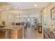 Open concept dining area with view into living room at 1300 N Portofino Dr # 305, Sarasota, FL 34242