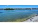 Stunning view of calm water, distant homes, and boats at 1300 N Portofino Dr # 305, Sarasota, FL 34242