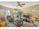 Relaxing living room with comfortable seating and balcony access at 1300 N Portofino Dr # 305, Sarasota, FL 34242