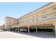 Parking garage with covered parking spaces at 1300 N Portofino Dr # 305, Sarasota, FL 34242