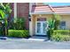 Community management office entrance with landscaping at 1300 N Portofino Dr # 305, Sarasota, FL 34242