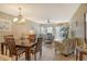 Open dining area with a view to the living room at 1300 N Portofino Dr # 305, Sarasota, FL 34242