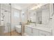 Spa-like bathroom with soaking tub and walk-in shower at 404 North Shore Dr, Anna Maria, FL 34216