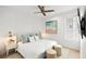 Spacious bedroom with king bed and coastal decor at 404 North Shore Dr, Anna Maria, FL 34216