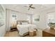 Main bedroom with light walls and private access to balcony at 404 North Shore Dr, Anna Maria, FL 34216