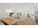 Open concept kitchen with island and breakfast nook at 404 North Shore Dr, Anna Maria, FL 34216