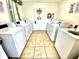 Convenient shared laundry room with multiple washers and dryers at 5408 Swift Rd # 28, Sarasota, FL 34231