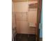 Well-organized closet with shelving units and storage space at 407 White Oak Way, Sarasota, FL 34237