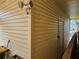 Exterior of home featuring durable siding, an outdoor light, and a water view at 407 White Oak Way, Sarasota, FL 34237