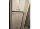 Hallway storage offers ample space and organization with its multiple cabinets and drawers at 407 White Oak Way, Sarasota, FL 34237
