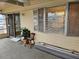 Back porch featuring an outdoor space with sliding glass doors, offering seamless indoor-outdoor flow at 407 White Oak Way, Sarasota, FL 34237