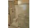 Shower stall featuring built-in seat, showerhead and glass door at 407 White Oak Way, Sarasota, FL 34237